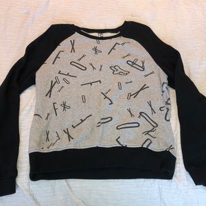 Black and grey fox crew neck sweater